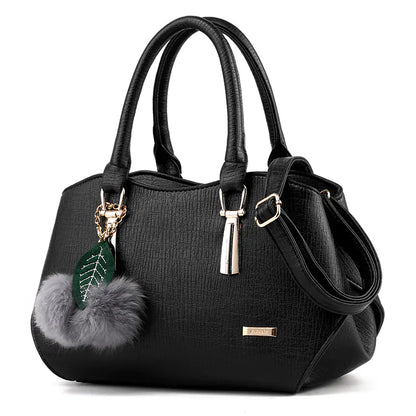 2025 luxury Fashionable Trendy Hanging Pom Pom Tote Bag