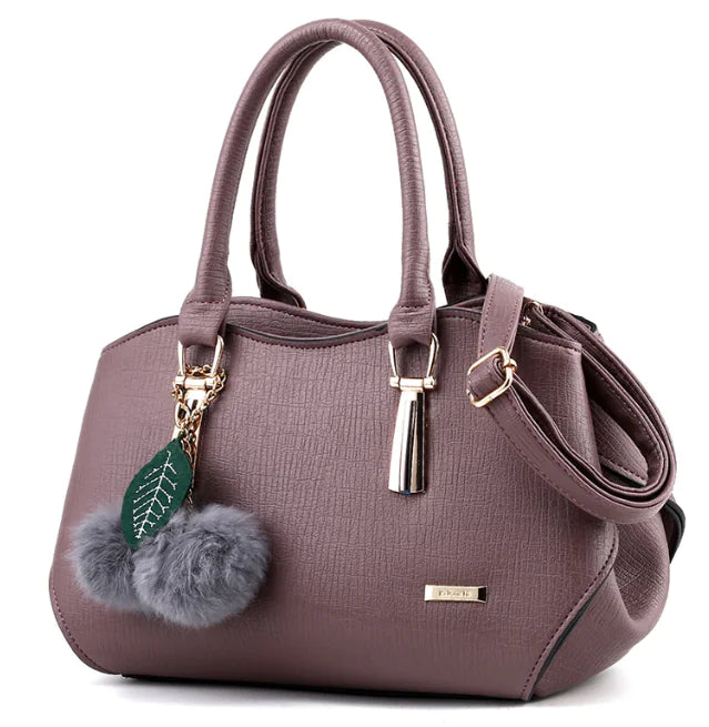 2025 luxury Fashionable Trendy Hanging Pom Pom Tote Bag
