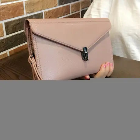 🔥 2025 Refined Genuine Leather Women's Clutch Bag - Stylish & Versatile