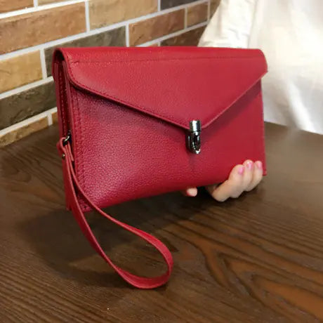 🔥 2026 Refined Genuine Leather Women's Clutch Bag - Stylish & Versatile